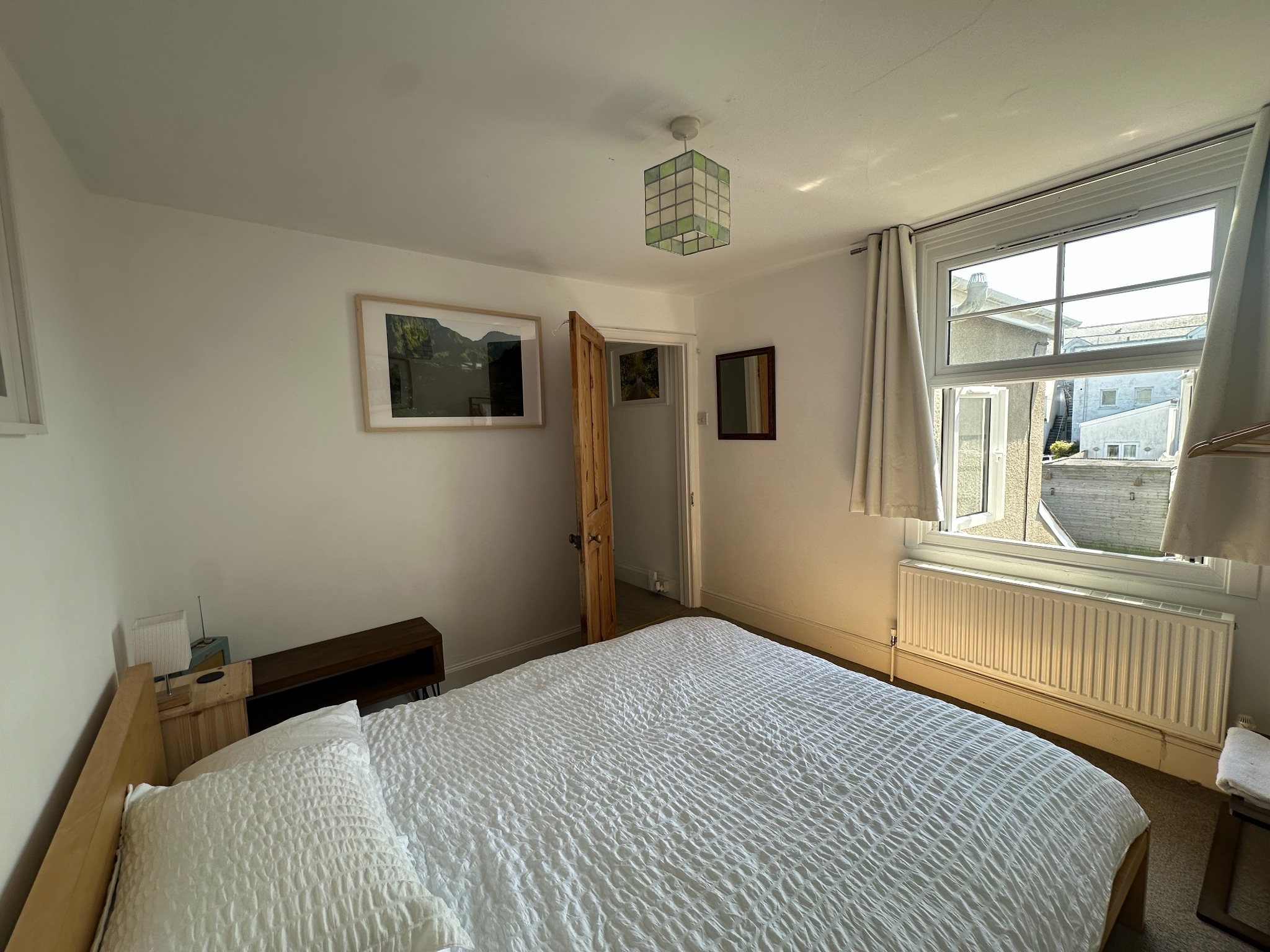 Second view of the queen bedroom with its garden outlook