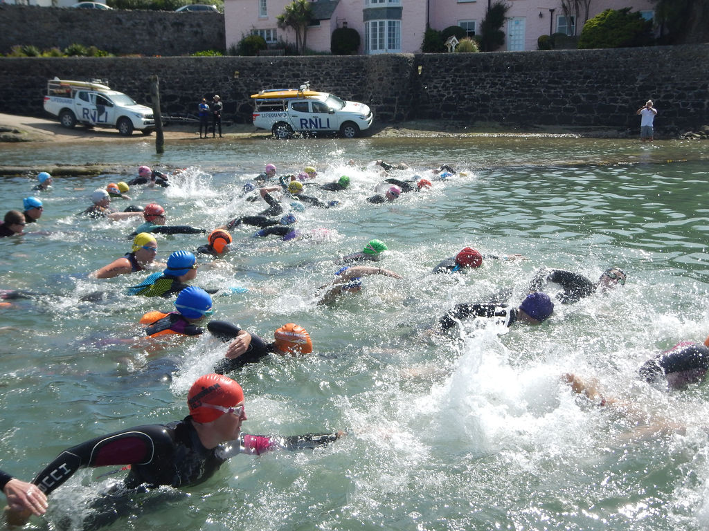 Organised open-water swimmers taking part in a Bude event