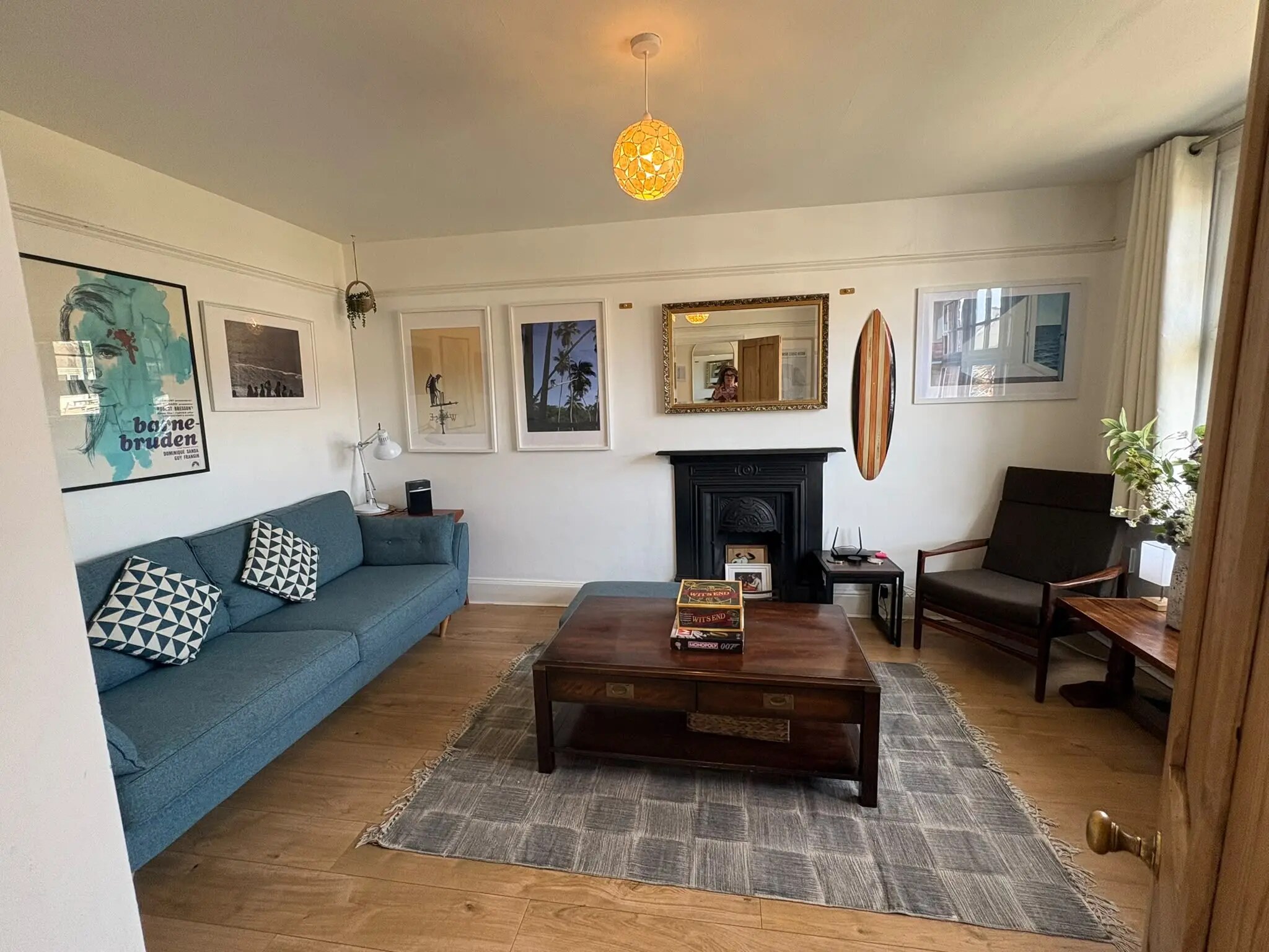 Bright family living room at Bude Surf Shack holiday home in Bude